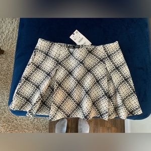 Plaid and pleated Mini Skirt with Flare